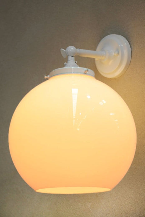 small white wall light with medium opal shade