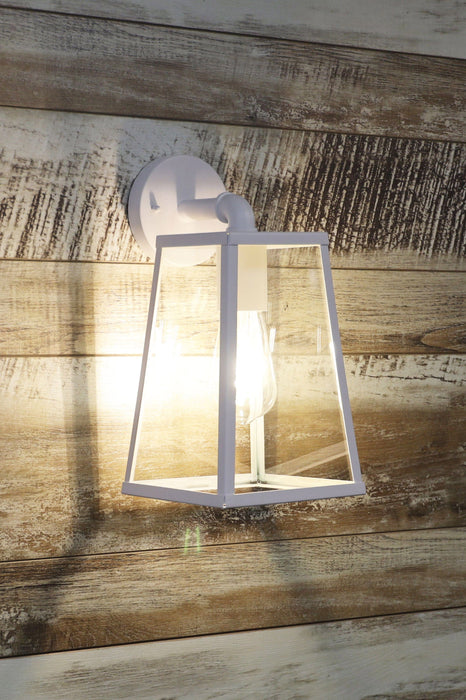 Outdoor white glass trapeze outdoor wall light on a wooden background