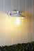 White variant of Cabin Outdoor Wall Light affixed on white wooden panel wall