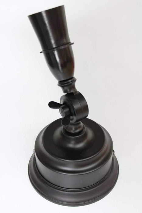 Black wall lamp holder on a black wooden mounting block