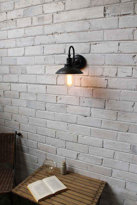 Wall light above table setting