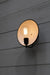 Reflector wall light with vintage bulb