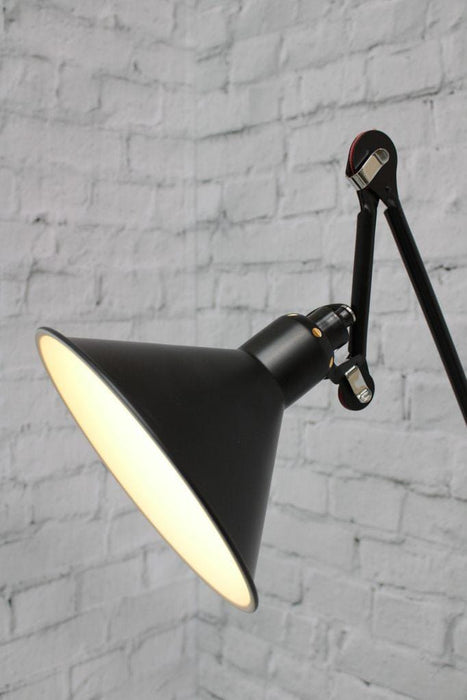 Wall light with adjustable shade