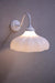 white sconce with glass shade