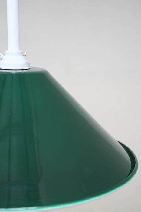 White pole pendant with green cone shade