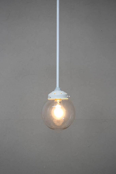 White pole pendant with small clear shade