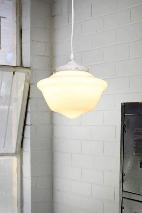 Small opal glass pendant light with round white cord