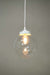White round cord pendant light with medium clear shade