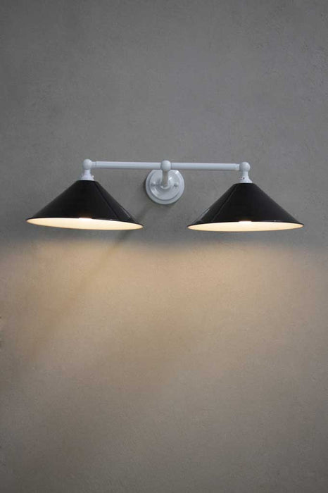 White double arm sconce with black shades