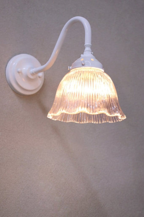 Steel white wall light with frill shade