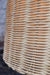 Close up of rattan pendant light with wicker hand woven shade