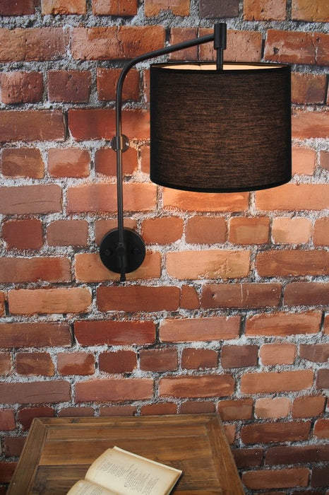 Wing arm wall light with black fabric shade