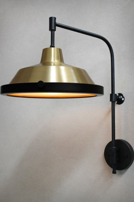 Bright brass wall light with frosted cover