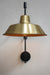 Wing arm wall light with bright brass shade