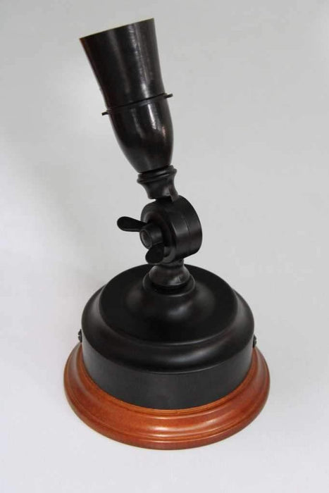 wooden mount with black lampholder skirt