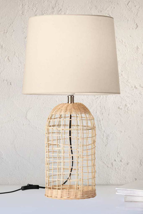Woven cane table lamp with white fabric base