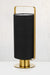 Side profile of mid-century lamp with black cylinder lamp and gold base