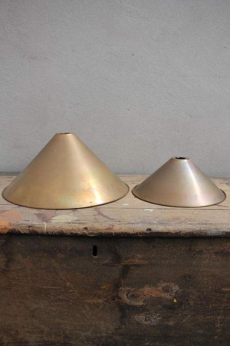 Aged brass cone shades large and small