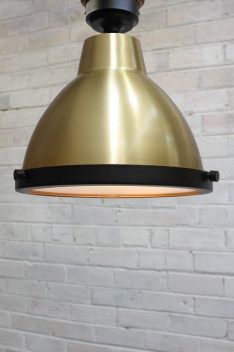 Bright brass flush mount with frosted glass cover