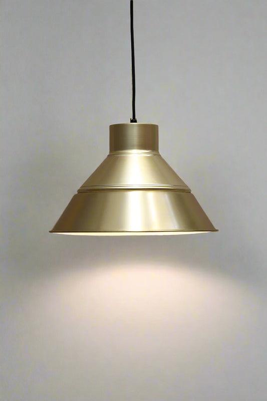Solid brass shade with gold/brass shade cover and black pendant cord. 