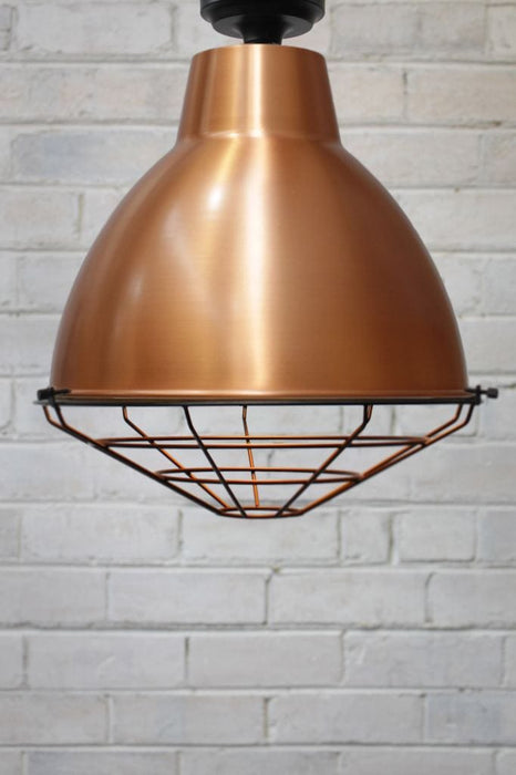 Bright copper flush mount with cage cover