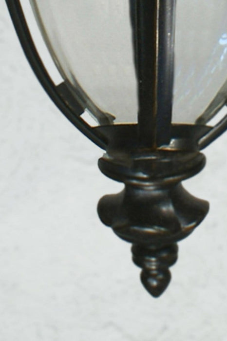 Antique bronze and glass exterior flush mount light