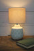 Ceramic table lamp with linen shade and batik pattern