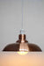 Copper shade with white cord and exposed bulb