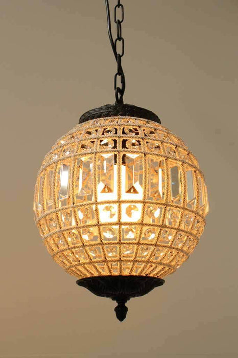 Crystal pedant light. ball light. mottles bronze pendant chain. antique style lampholder.  