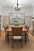 four light glass chandelier over dining table