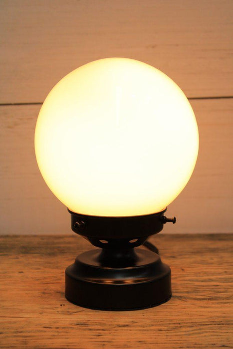 glass ball lamp with black base