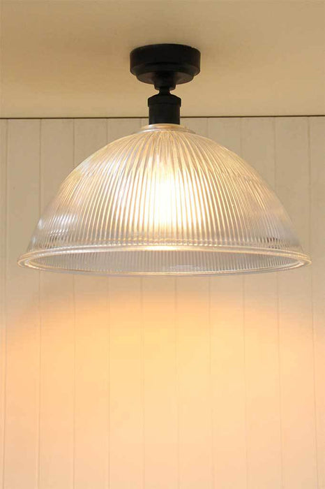 glass ceiling light with black lampholder