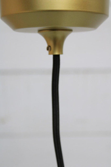 Gold/brass ceiling rose with black fabric cord