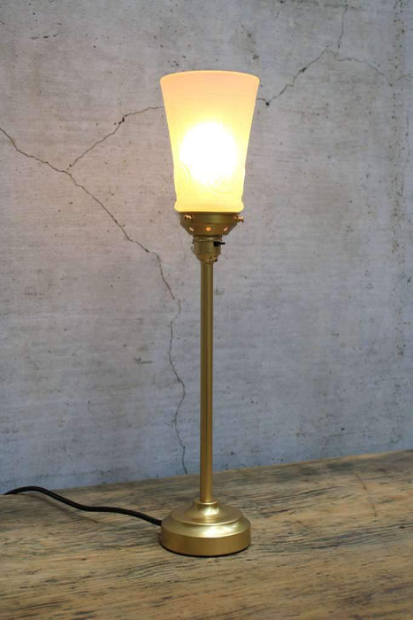 gold table lamp with gold gallery