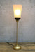 gold table lamp with black gallery