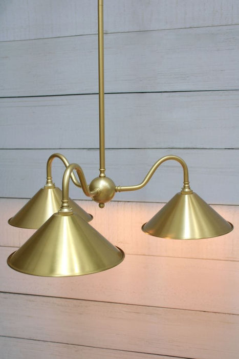 gold base chandelier with bright brass cone shades