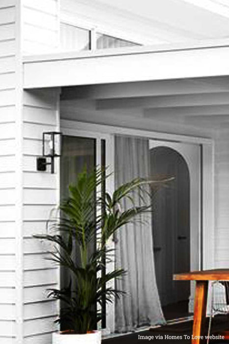 black outdoor wall light in the front porch