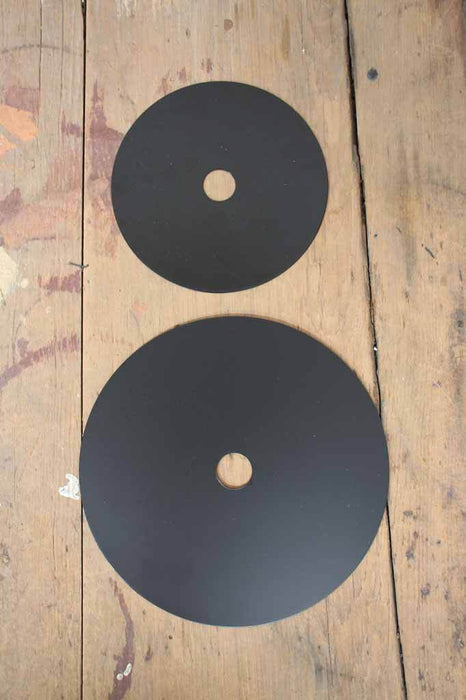 Large and small black disc wall light