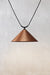 Large bright copper cone shade on trapeze pendant