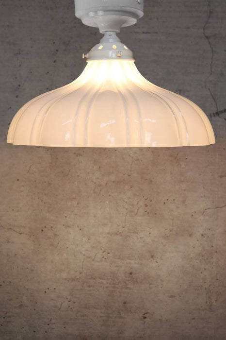 Large glass shade with white batten