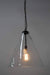large glass shade with round filament bulb
