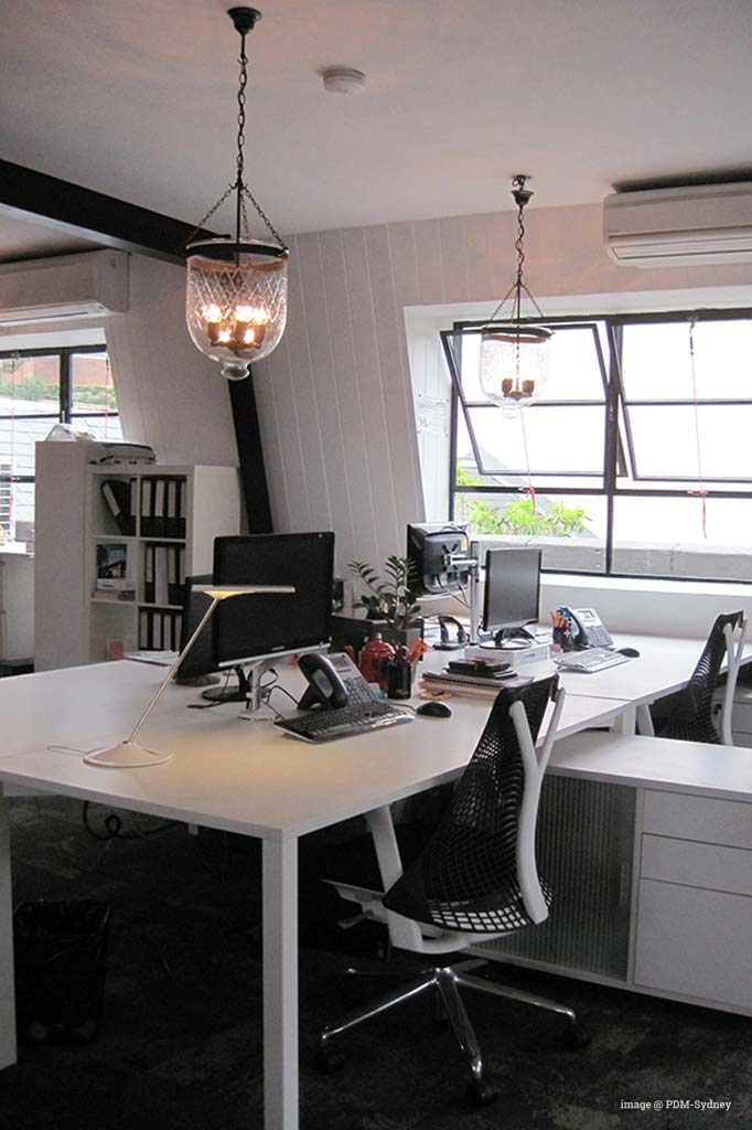 Float-glass-pendant-light-in office setting