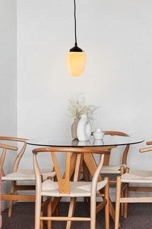 Hanging Light with art deco style over a dining table..