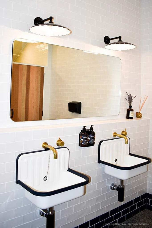 wall lights over sink in bathroom