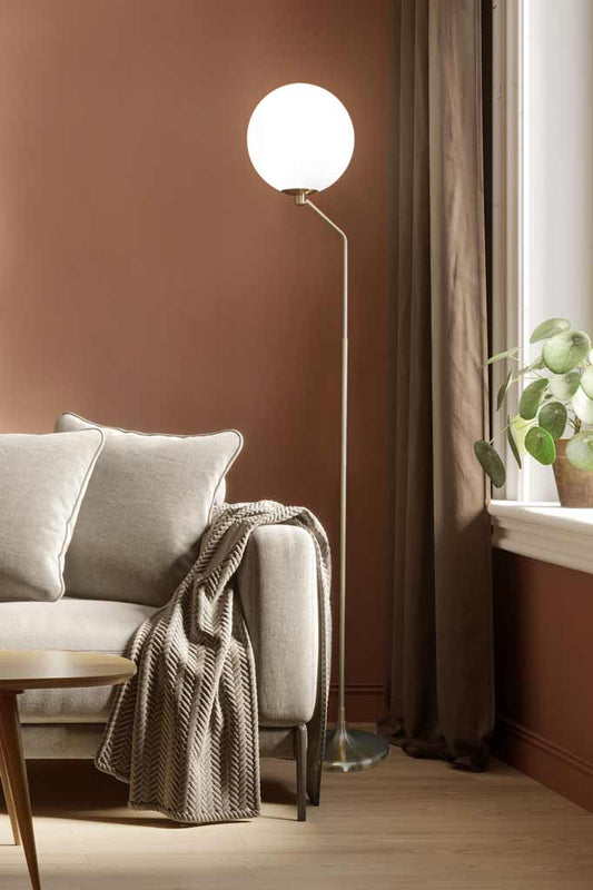 floor lamp behind couch