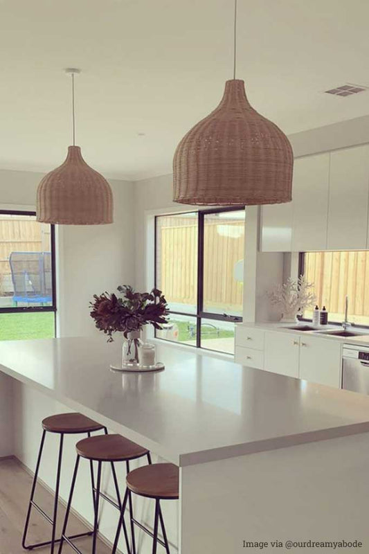 wicker pendant light over kitchen island