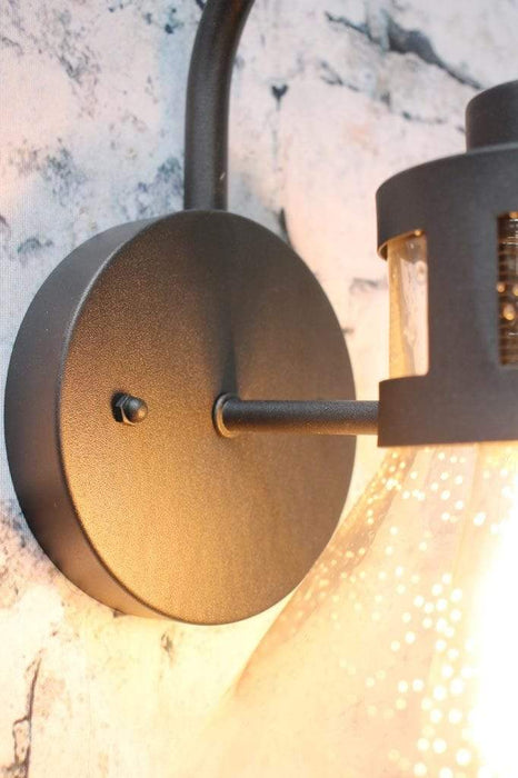 Matt black wall mounting plate for wall lamp