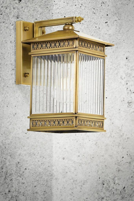 reeded glass brass wall lamp