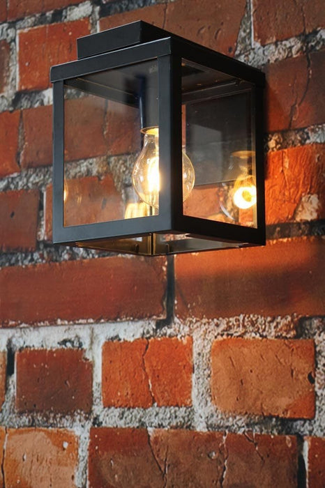 Outdoor porch light with black steel frame and glass panels