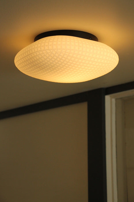 Oyster style ceiling light is the perfect fitting for an ensuite bathroom or powder room